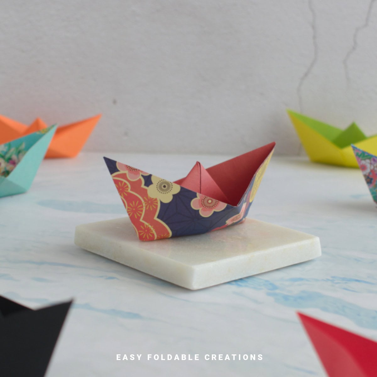Close up image of origami boats.