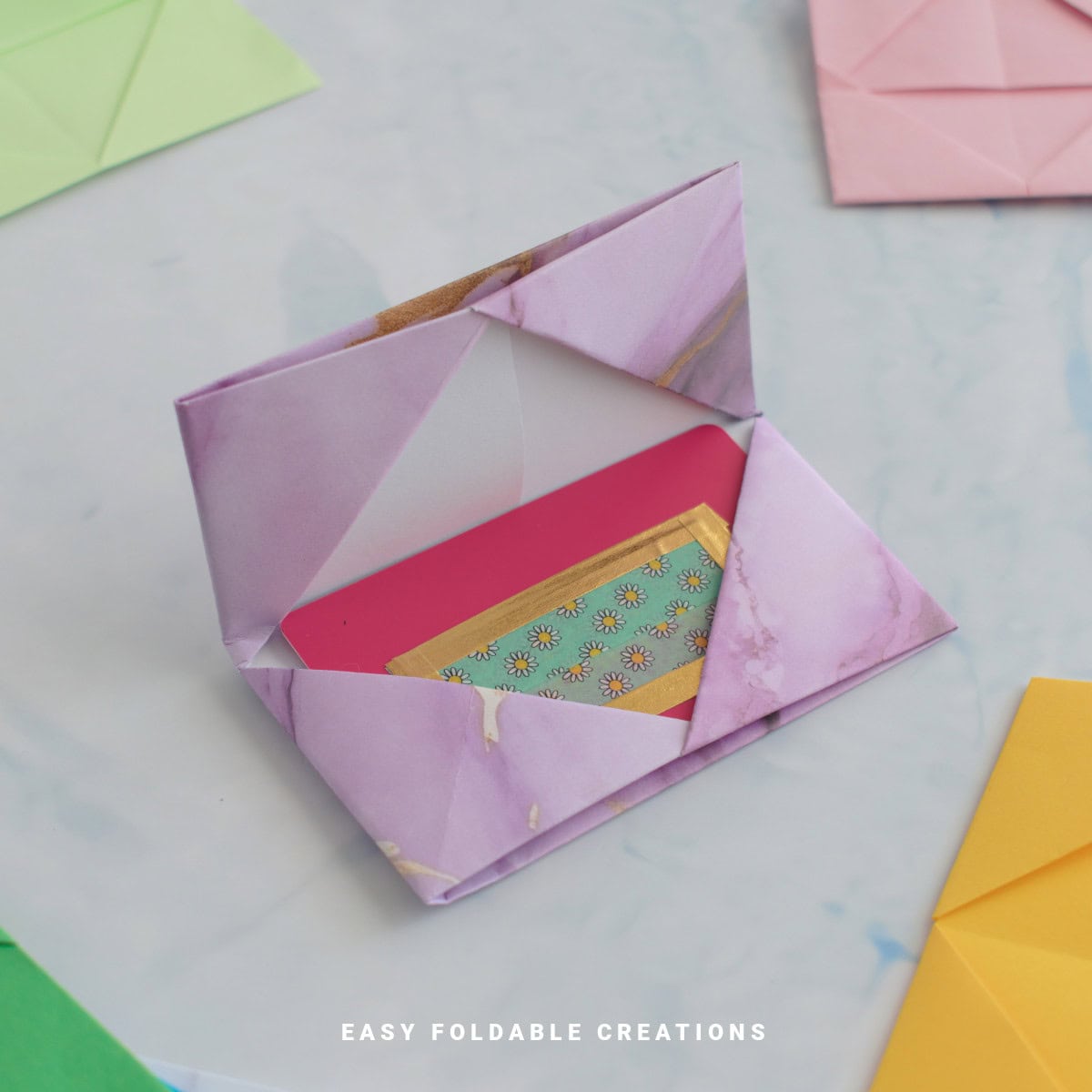 Close up image of a pink paper card holder.