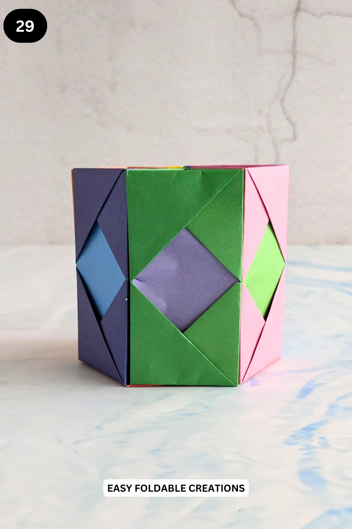 Step 29 for folding a hexagon DIY pen holder.