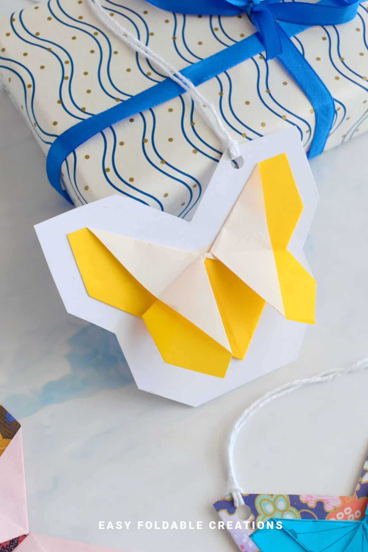 Yellow and white butterfly gift tag.