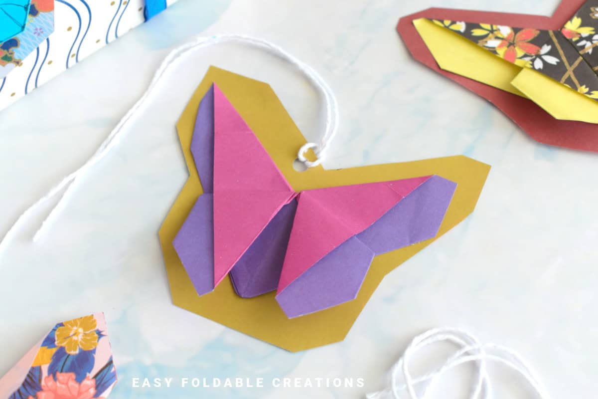 Close up image of a butterfly swing tag.