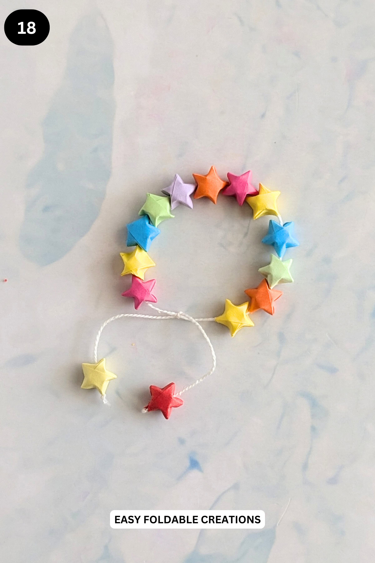 Step 18 for putting the star bracelet together.