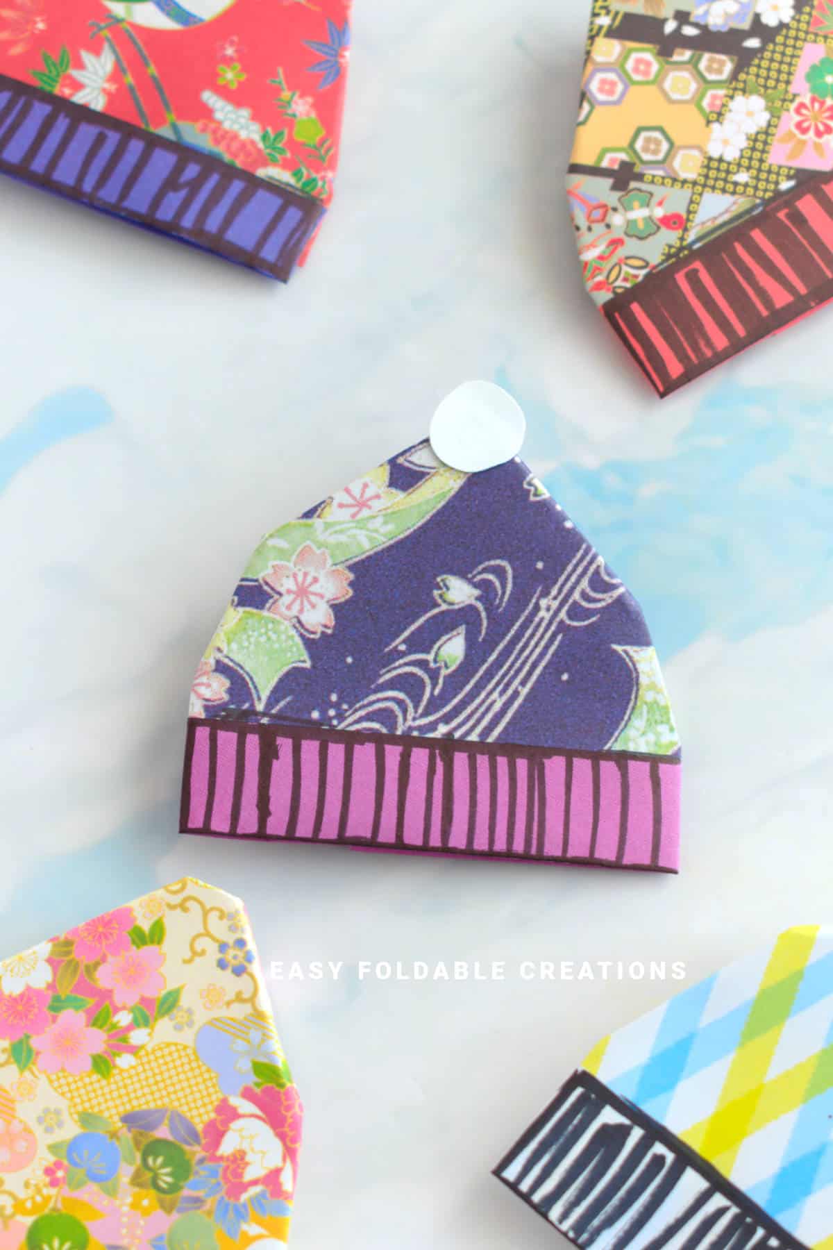 Purple and blue origami beanie.