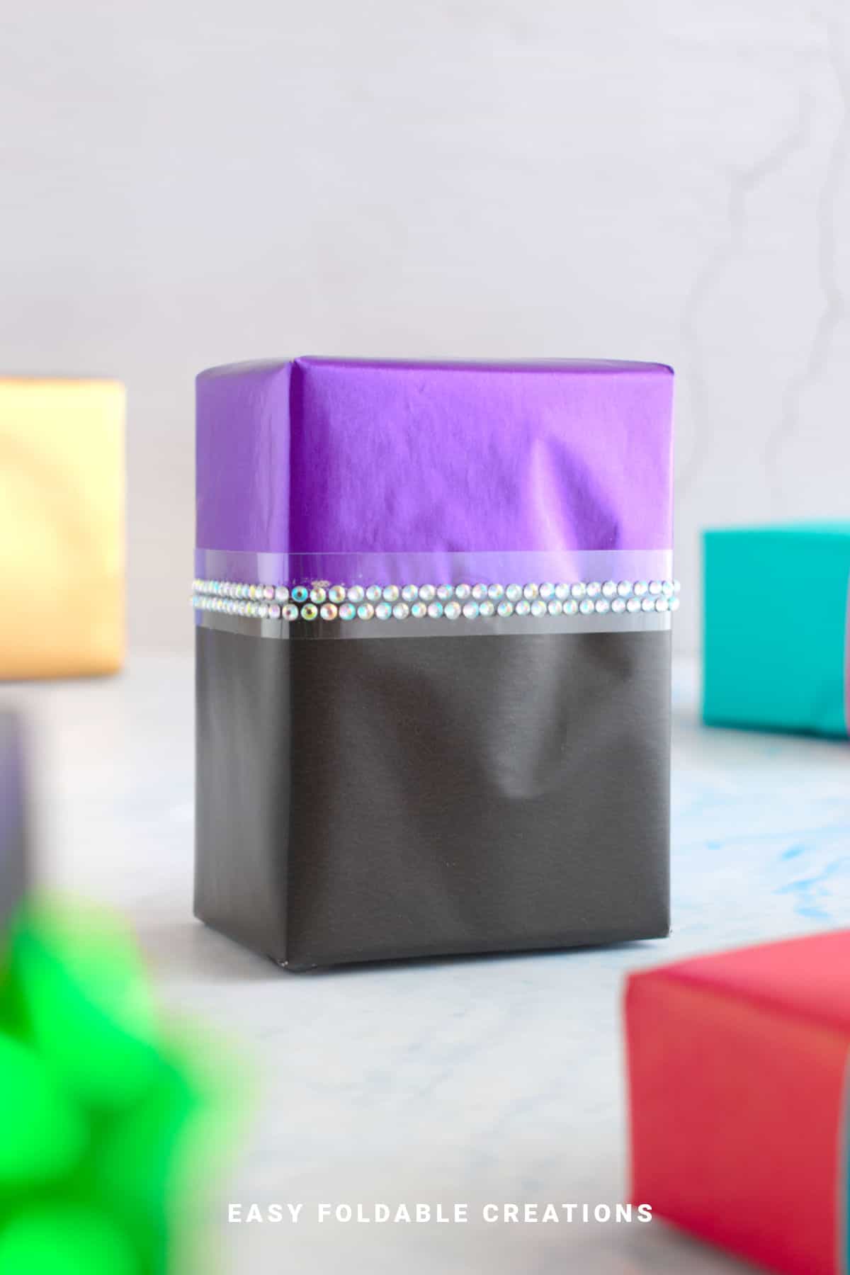 Purple and black wrapped gift.