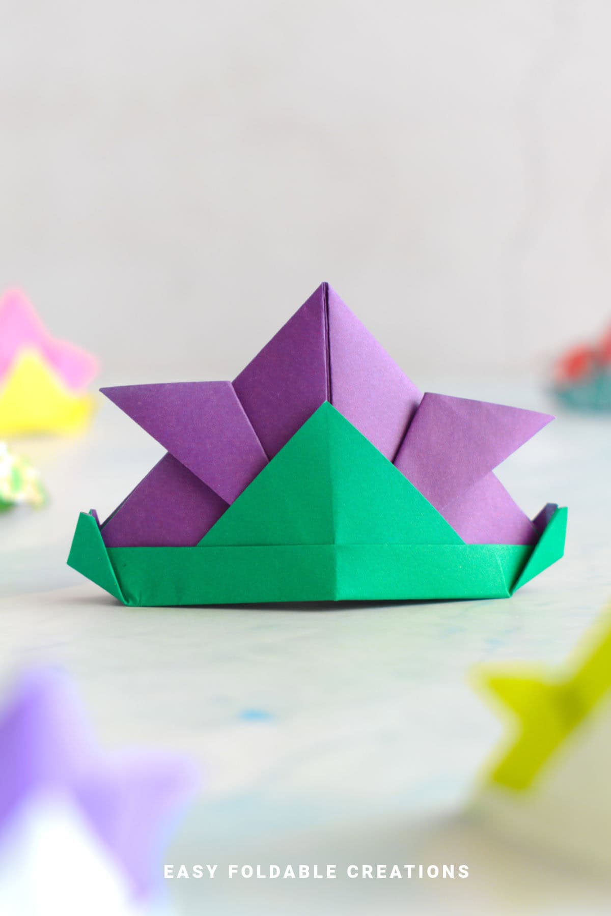Purple and green origami samurai hat.