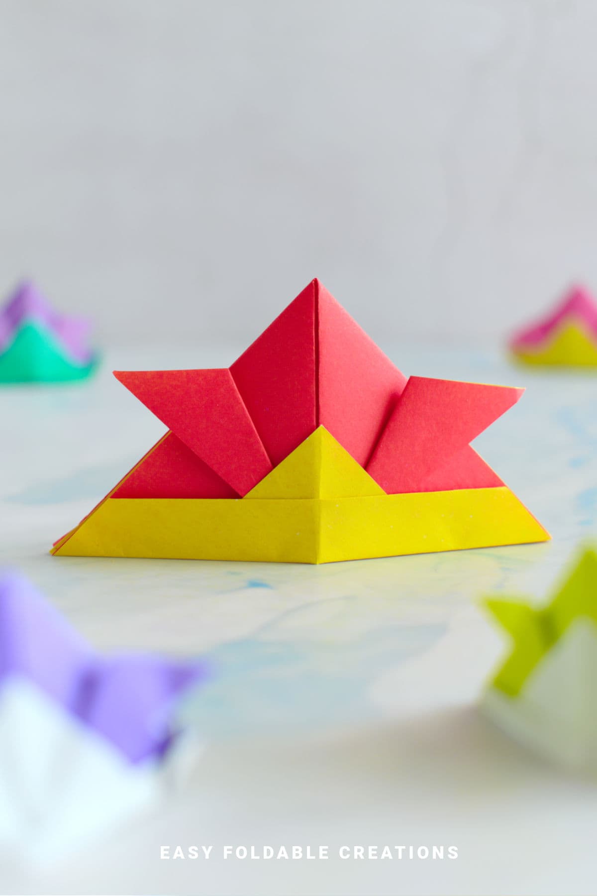 Red and yellow origami samurai hat.
