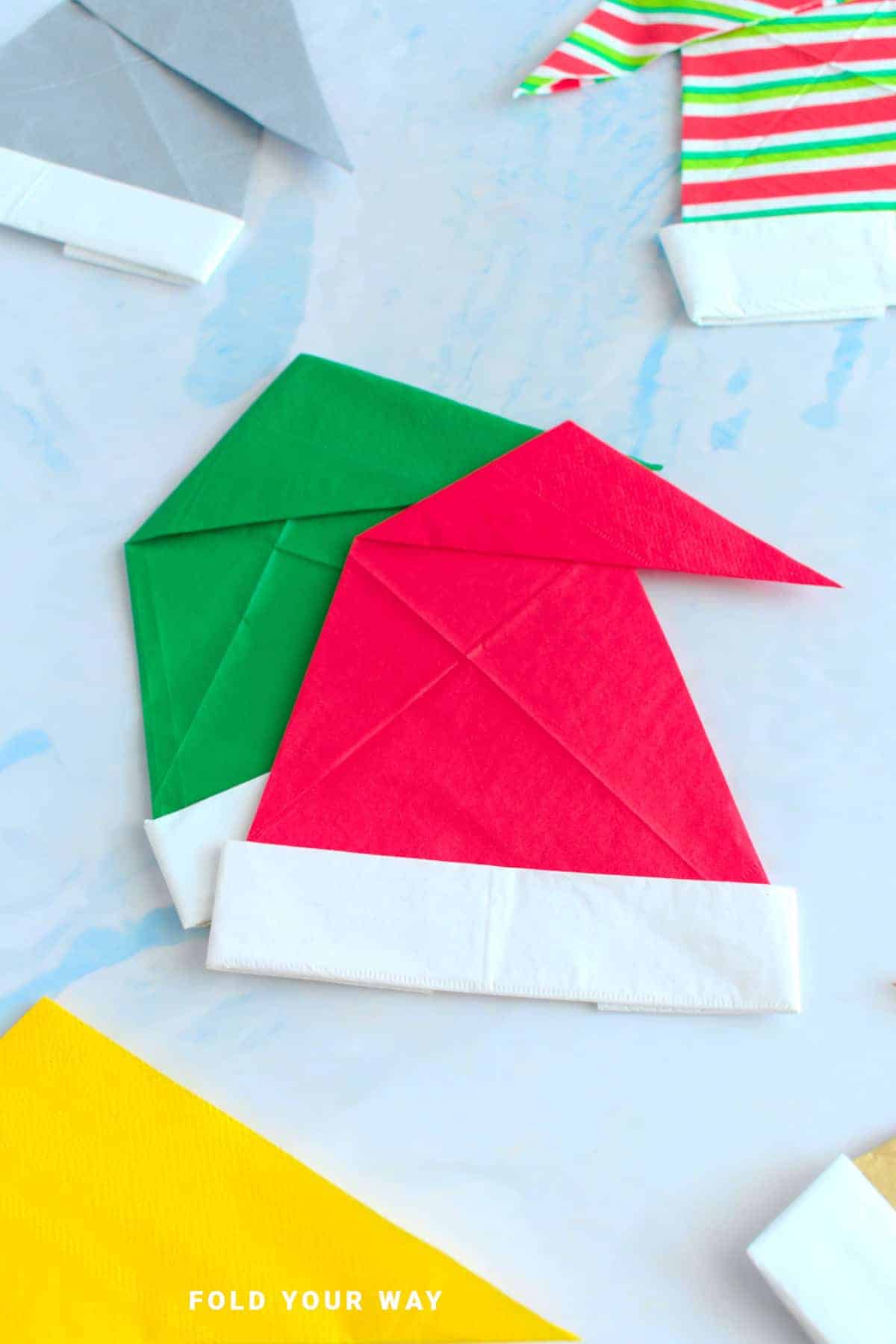 Santa hat napkin fold.