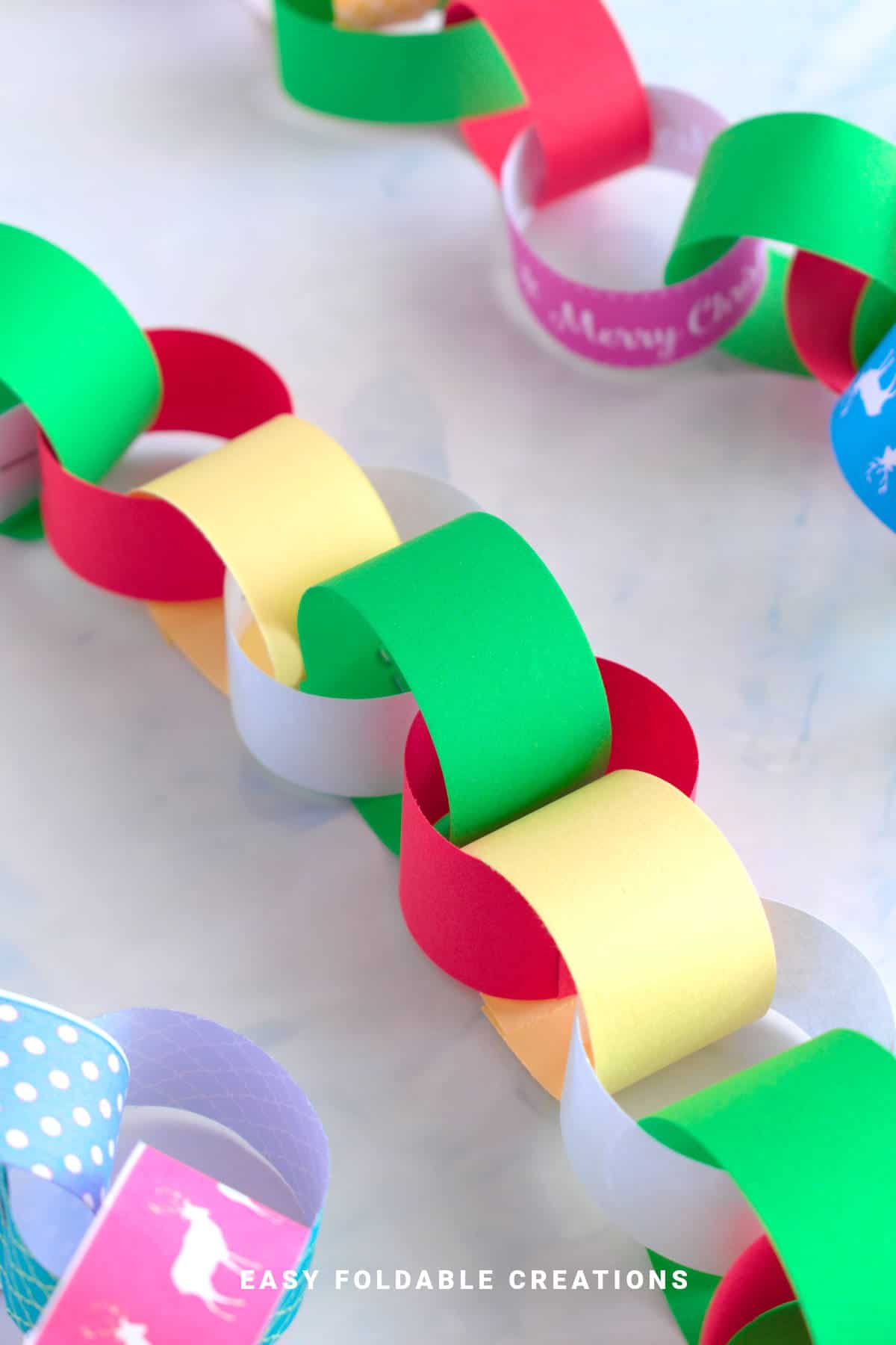 Red, yellow, green, and white paper chain.