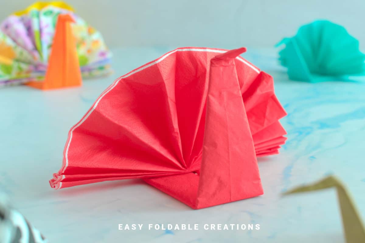 Red turkey napkin fold.