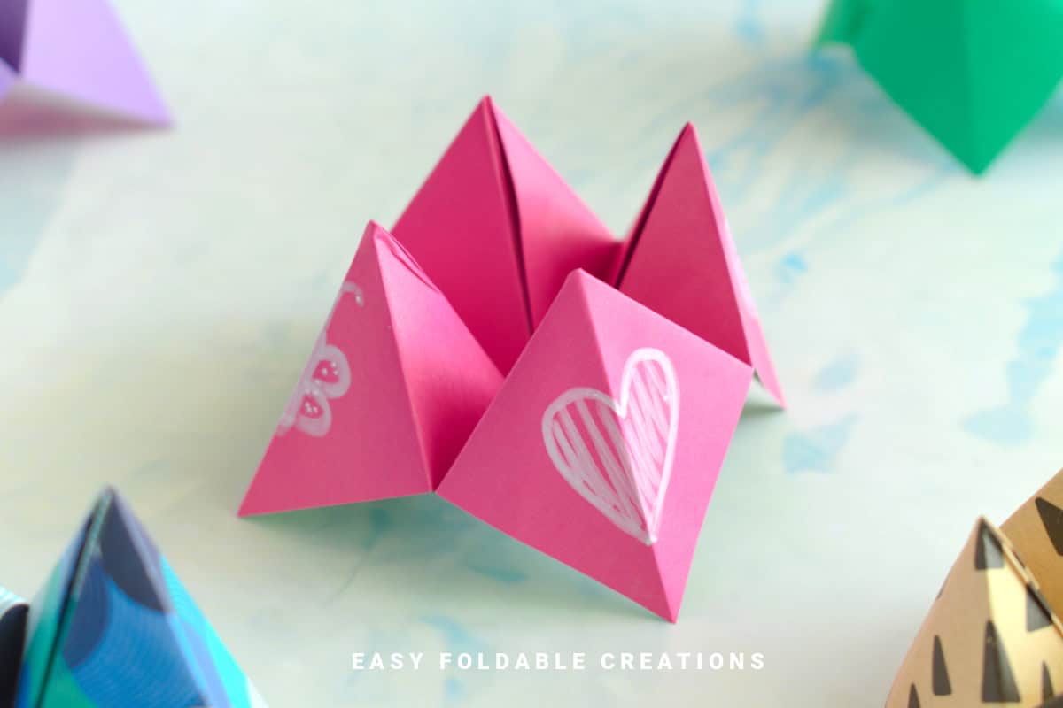 Pink origami fortune teller.
