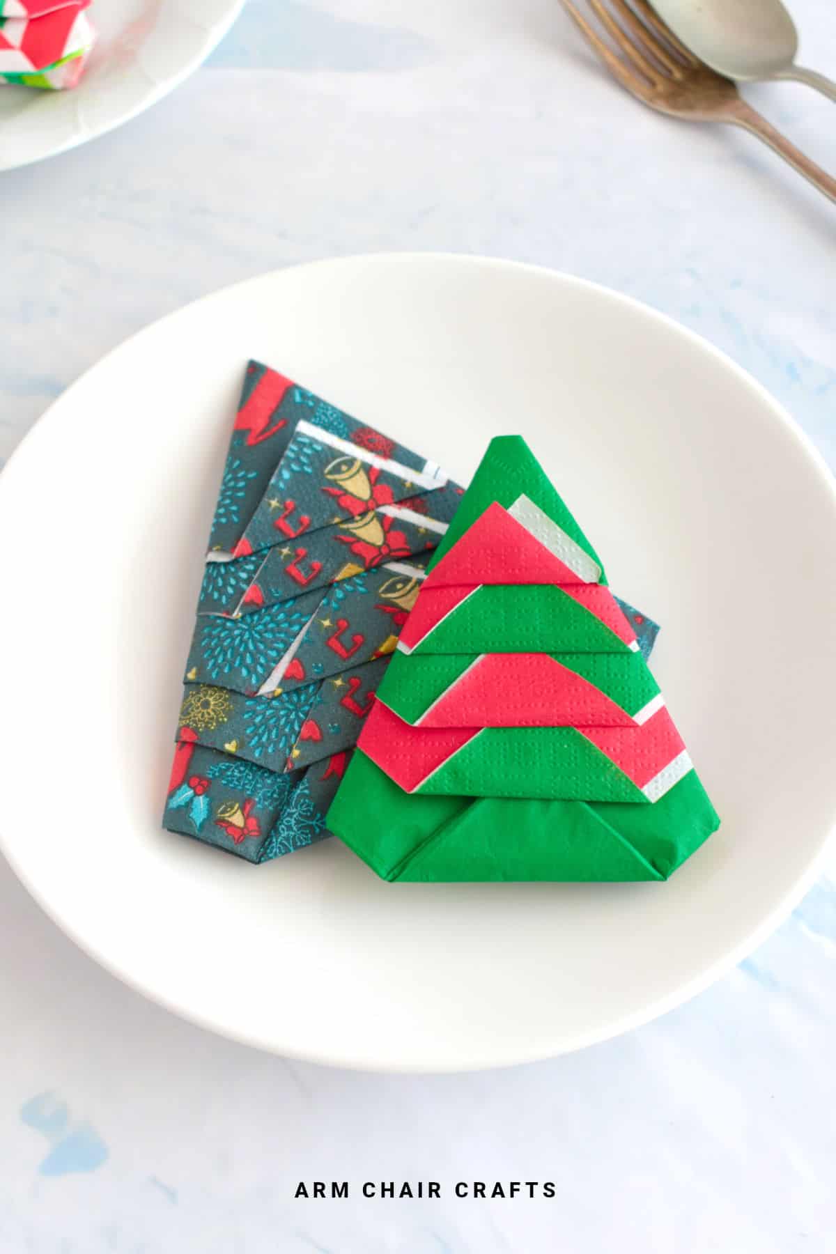 Christmas tree napkin folds.