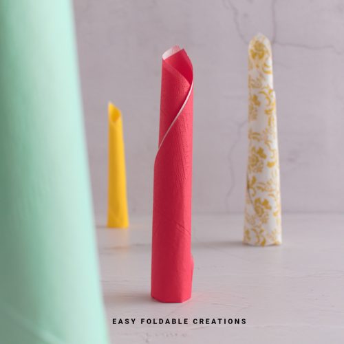 Red candle napkin fold.