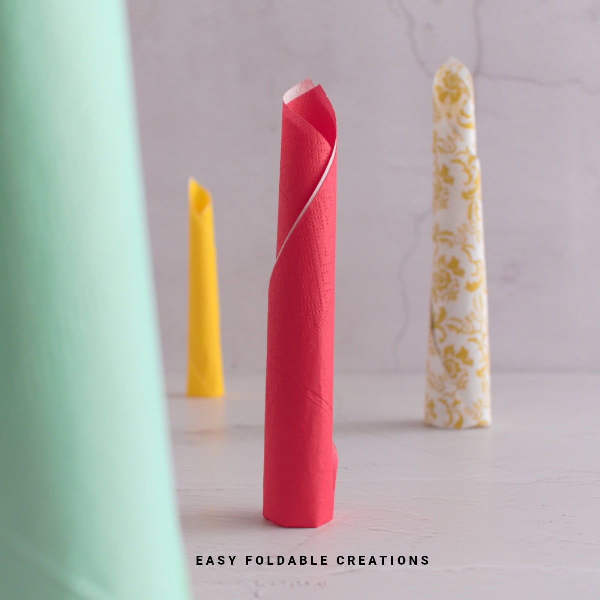 Red candle napkin fold.