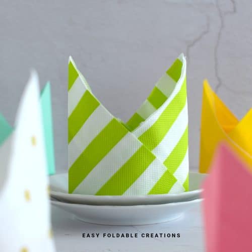 Close up image of a crown napkin fold.