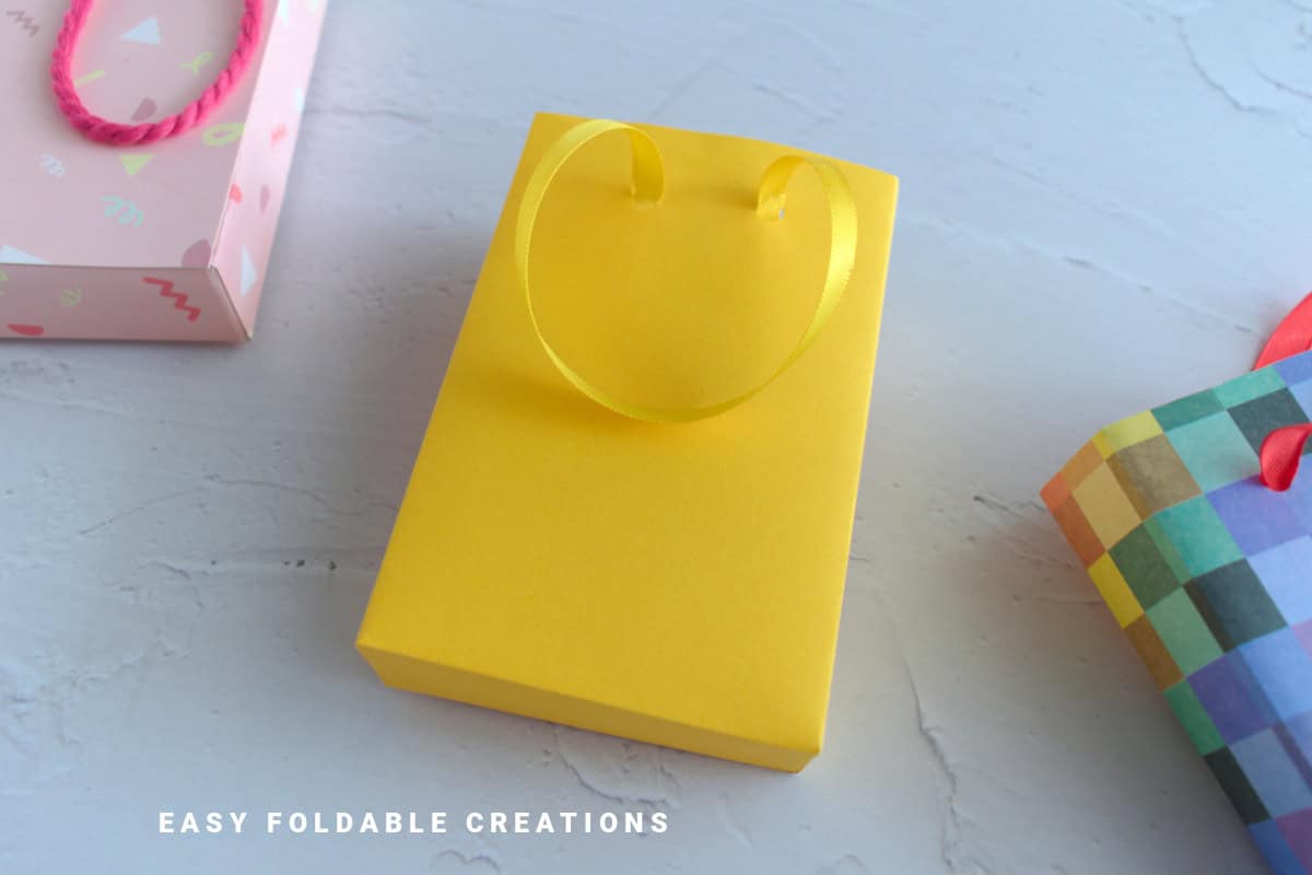 Yellow gift bag.